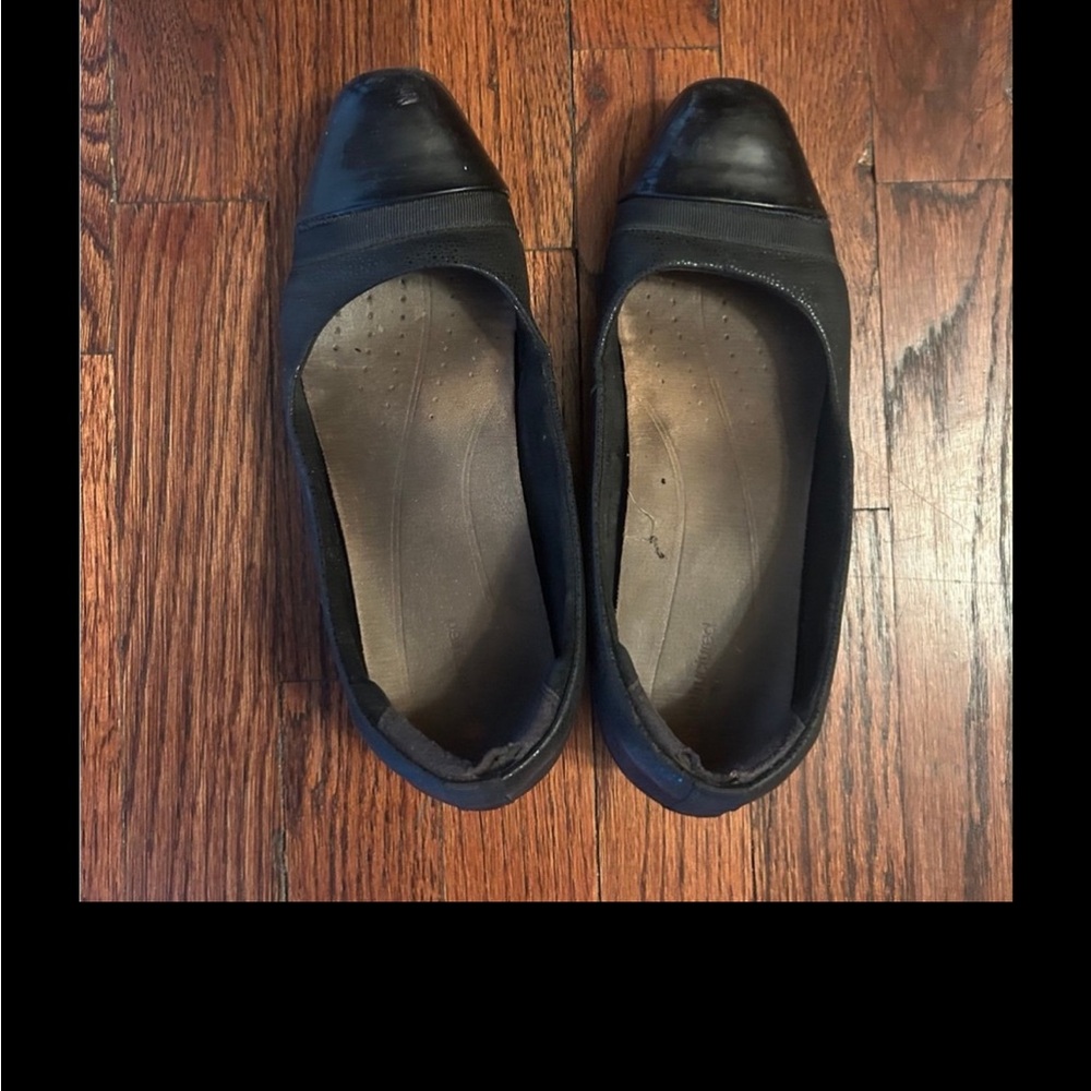 Clark’s cream and black pair